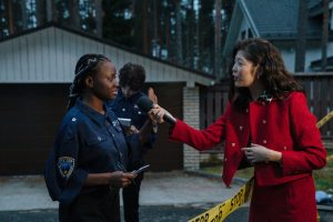 A journalist interviewing a policewoman at a crime scene during twilight. — Football Betting Maximizes Matchday Thrill With D